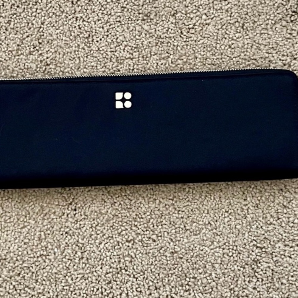 Kate Spade black nylon
clutch in excellent condition